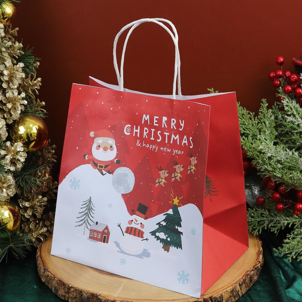 ถุงกระดาษหูเกลียว พิมพ์ลาย santa&snow park 23x15x23 ซม.