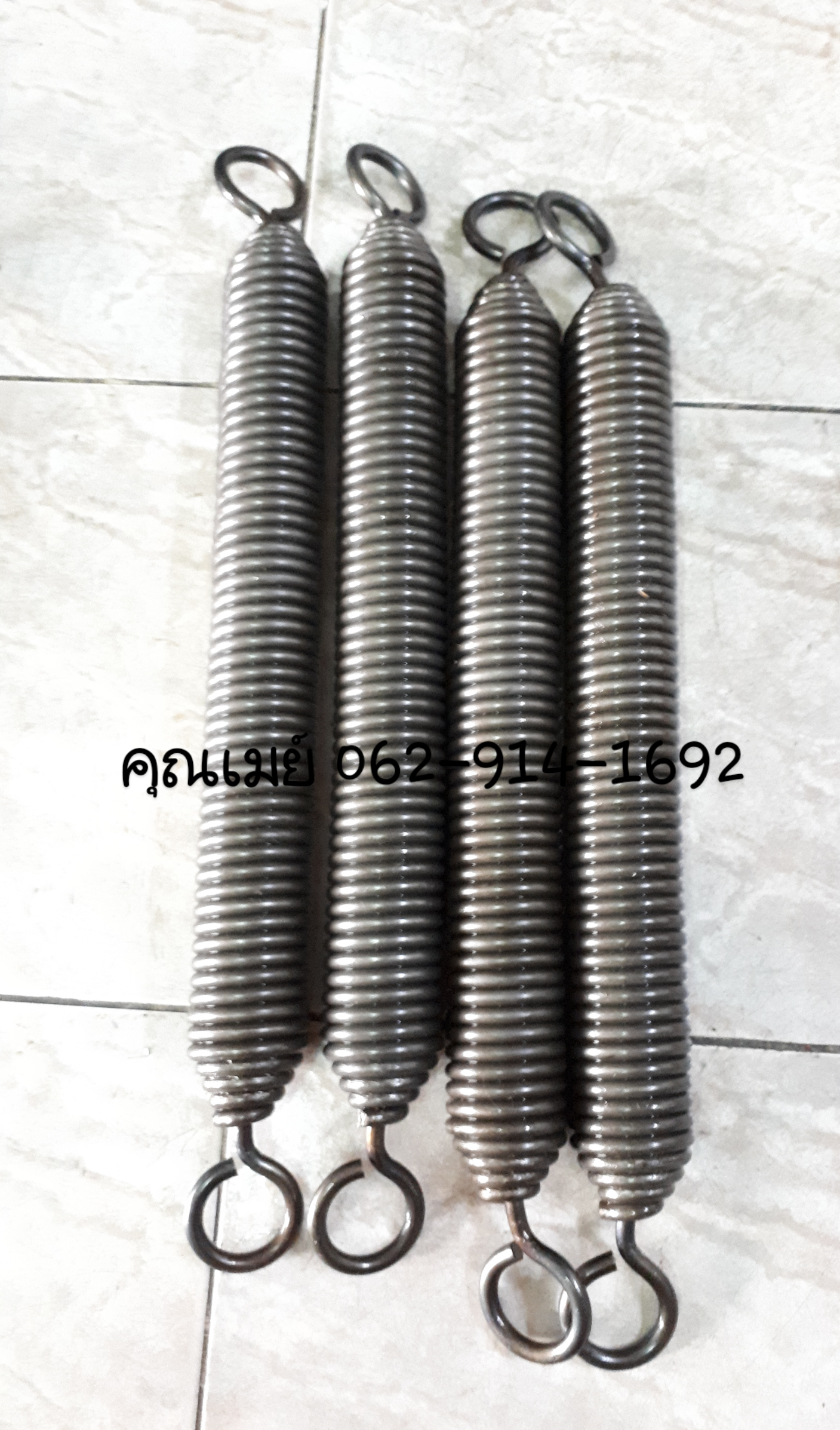 สปริงสแตนเลส ดึงตู้เย็น รับทำสปริงสแตนเลส. โทร : 062-914-1692