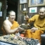 เหรียญหยดน้ำหลวงปู่ฮก วัดราษฎร์เรืองสุข อ.บ้านบึง จ.ชลบุรี (เลี่ยมประกบ 2 เหรียญ)